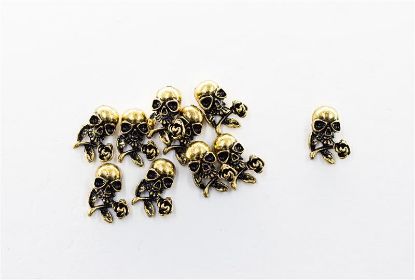 Picture of GOLD SKULL WITH FLOWER CHARMS